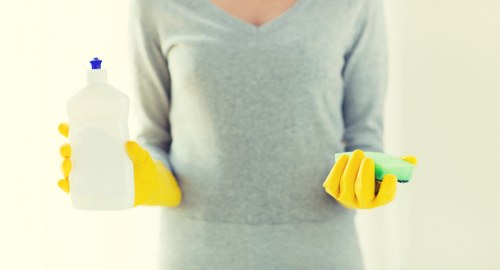 Carpet cleaning team following a workplace safety policy